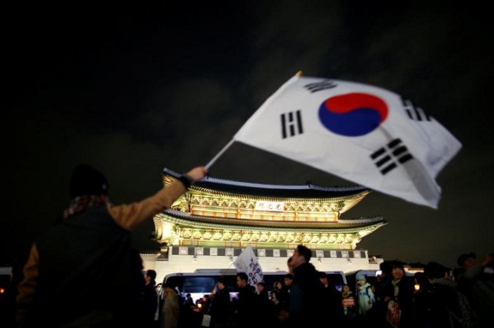 South Korea seeks arrest of daughter of Park`s friend at center of scandal 